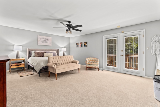 bedroom with baseboards, french doors, carpet flooring, and access to exterior