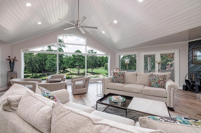 living area with recessed lighting, wood finished floors, wood ceiling, vaulted ceiling, and ornamental molding