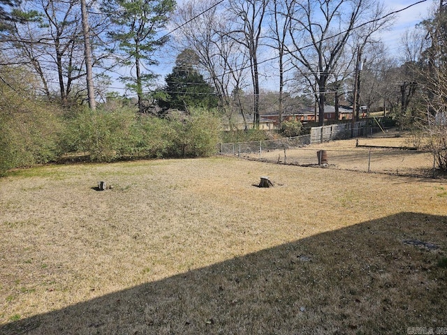 view of yard featuring fence