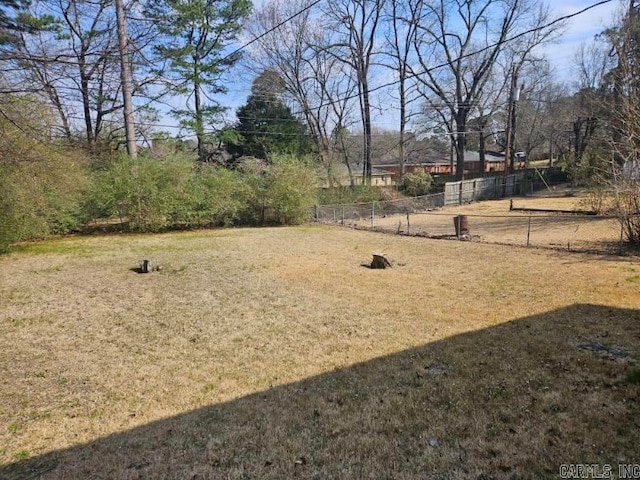 view of yard with fence