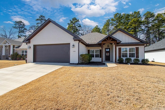 view of front of home with brick siding, concrete driveway, an attached garage, board and batten siding, and a front yard