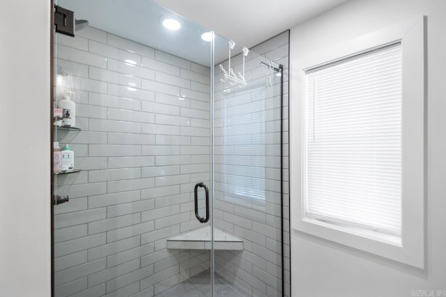 full bathroom featuring a shower stall