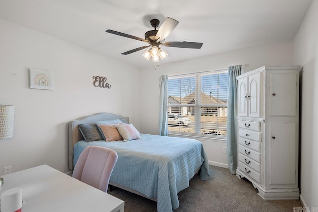 bedroom with carpet floors, ceiling fan, and baseboards