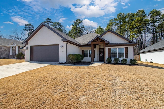 view of front of property featuring concrete driveway, an attached garage, a front lawn, board and batten siding, and brick siding