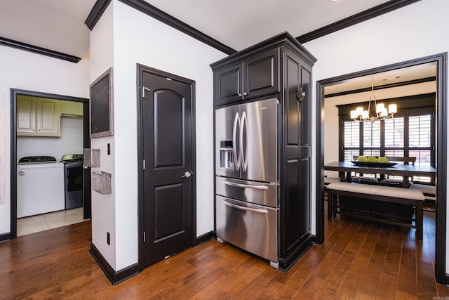 kitchen featuring ornamental molding, dark wood-style flooring, stainless steel refrigerator with ice dispenser, and an inviting chandelier