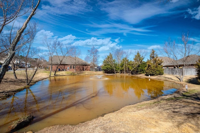 view of water feature featuring fence