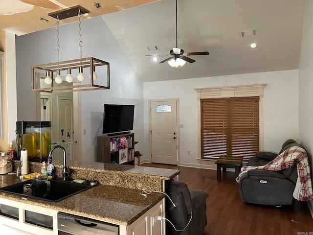 kitchen featuring visible vents, open floor plan, and dishwasher