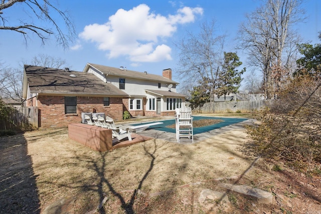 view of pool featuring a patio and a fenced backyard