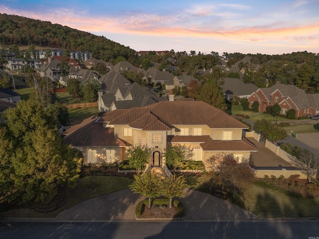 aerial view at dusk with a residential view