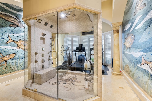 workout room featuring lofted ceiling, decorative columns, and tile patterned floors