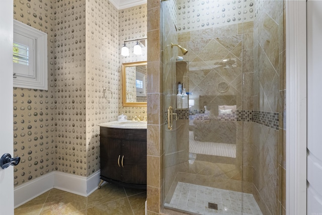 full bath featuring tile patterned floors, walk in shower, and vanity