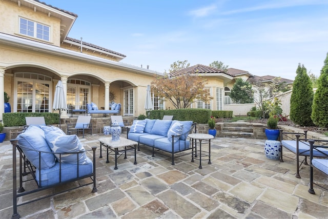 view of patio with an outdoor hangout area and french doors