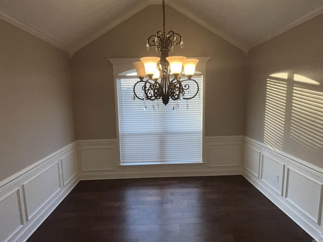 unfurnished dining area featuring lofted ceiling, a wainscoted wall, a chandelier, and dark wood-type flooring