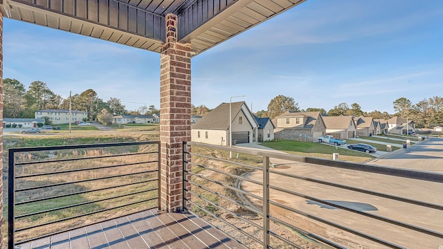 balcony featuring a residential view