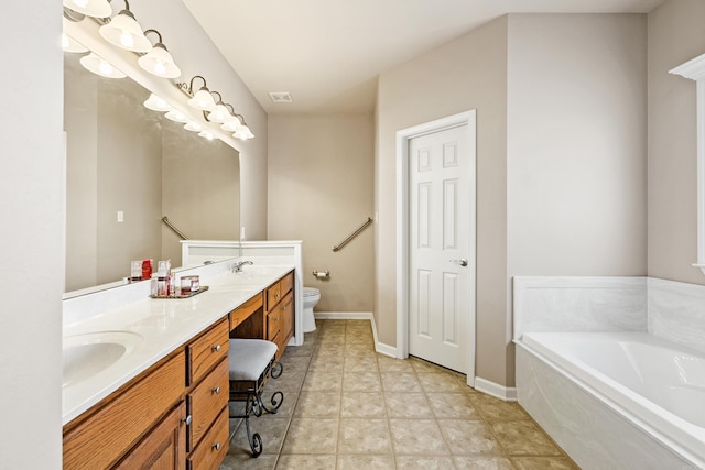 bathroom featuring double vanity, visible vents, toilet, a bath, and a sink