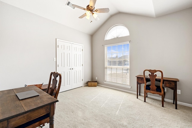 home office with a ceiling fan, lofted ceiling, carpet flooring, and baseboards