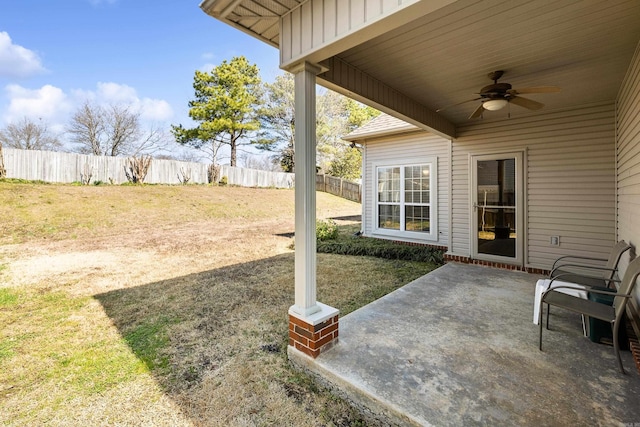 exterior space with ceiling fan, a patio area, and fence