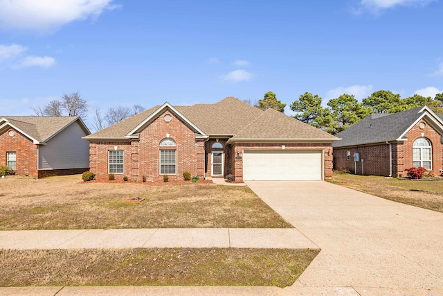 view of front of house with a shingled roof, brick siding, driveway, and an attached garage