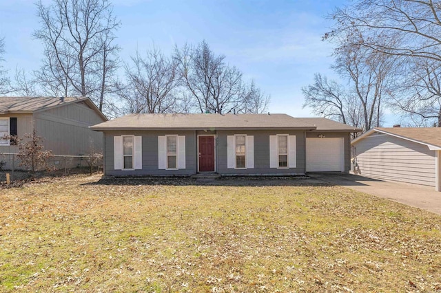 222 Lonsdale Cir, Jacksonville, AR 72076 - ranch-style house with a garage, fence, concrete driveway, and a front yard