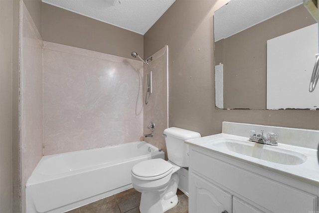 bathroom featuring toilet, washtub / shower combination, vanity, a textured ceiling, and tile patterned flooring