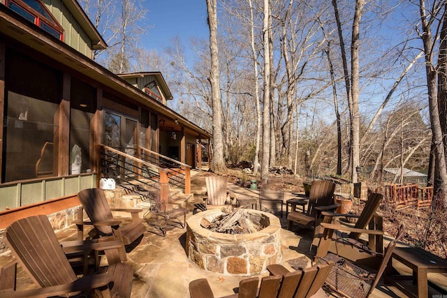 view of patio / terrace featuring a fire pit