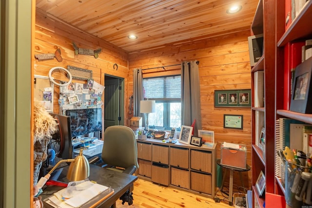 office featuring light wood-type flooring, wood ceiling, wood walls, and recessed lighting