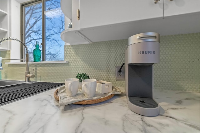 interior details with light stone counters and open shelves