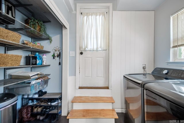 washroom with laundry area and washer and clothes dryer