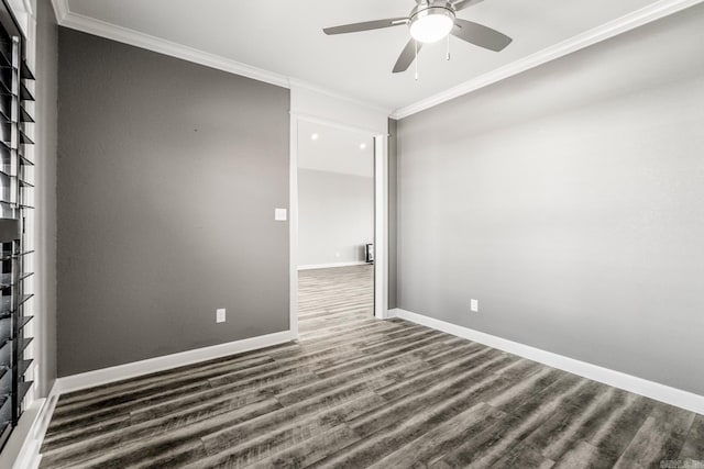 empty room with a ceiling fan, baseboards, ornamental molding, and wood finished floors