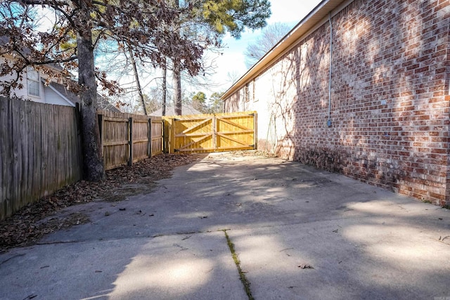 view of patio / terrace with a gate and fence