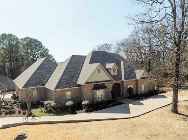 view of front of house with brick siding