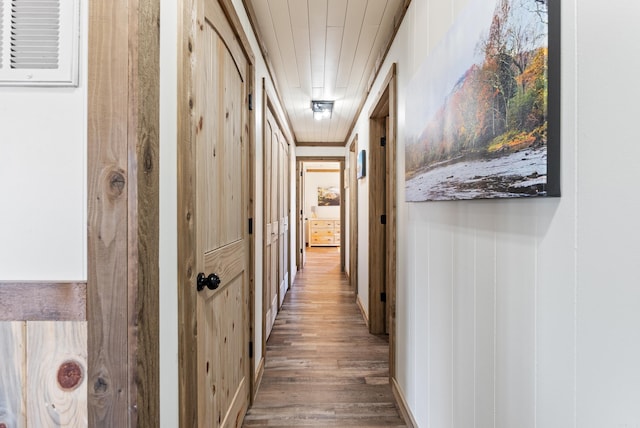 corridor featuring wood finished floors