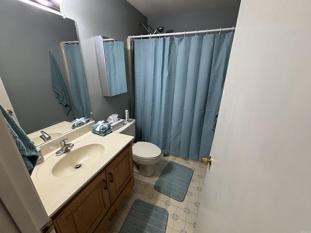 full bath featuring curtained shower, vanity, and toilet