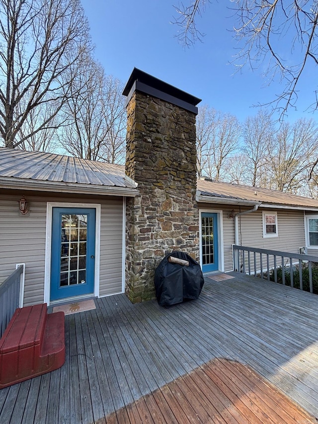 wooden deck with area for grilling