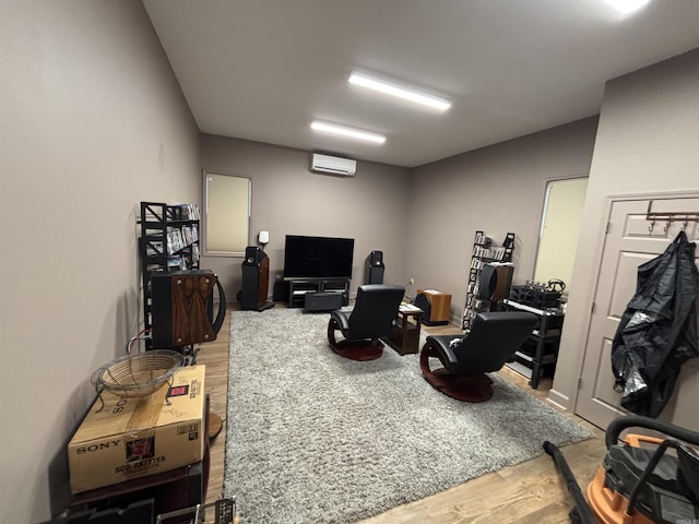 interior space featuring a wall unit AC and wood finished floors