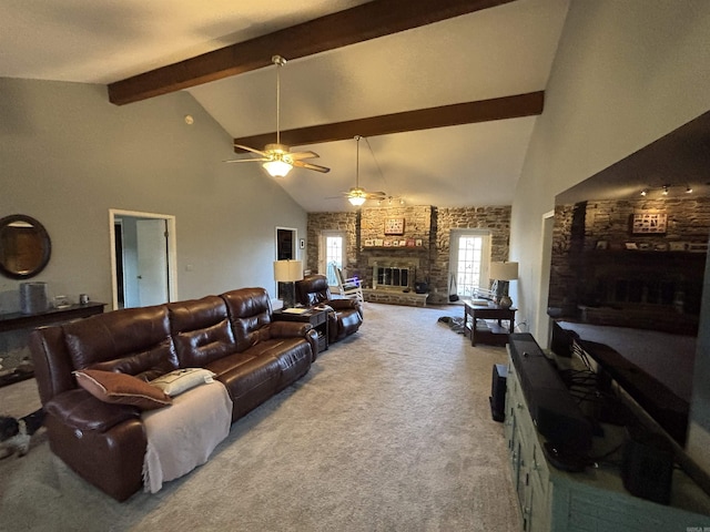 living area featuring a large fireplace, high vaulted ceiling, beamed ceiling, and carpet