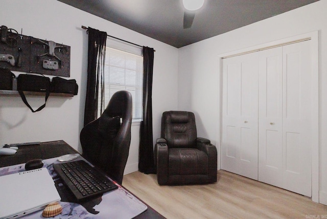 office area with light wood-style floors