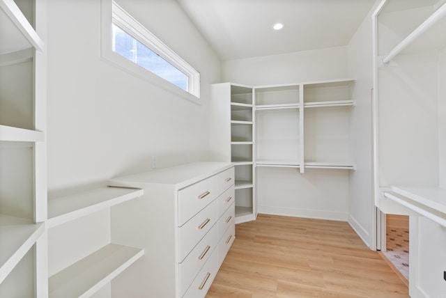 spacious closet with light wood-style floors