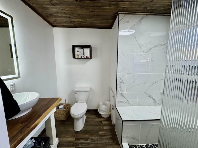 full bath with toilet, wooden ceiling, wood finished floors, walk in shower, and vanity