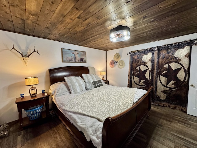 bedroom with wooden ceiling and wood finished floors