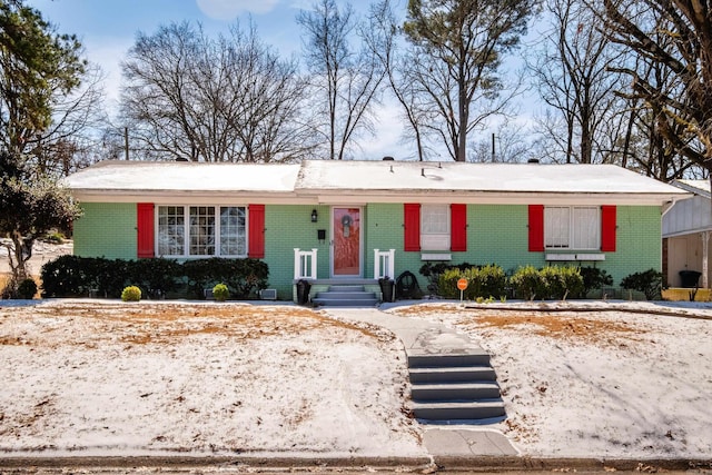 single story home with brick siding