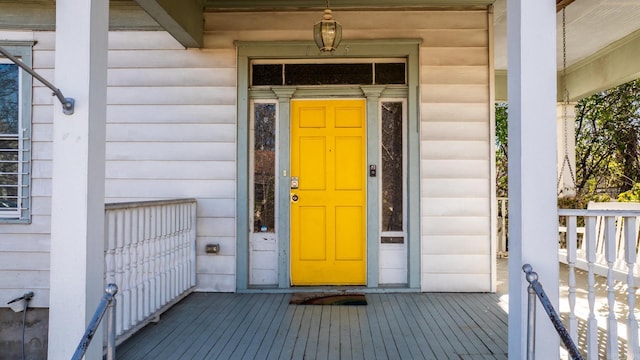 entrance to property with covered porch