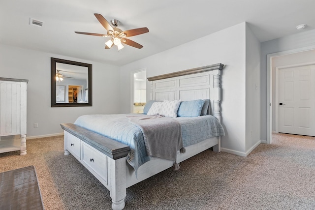 bedroom featuring a ceiling fan, visible vents, light carpet, and baseboards