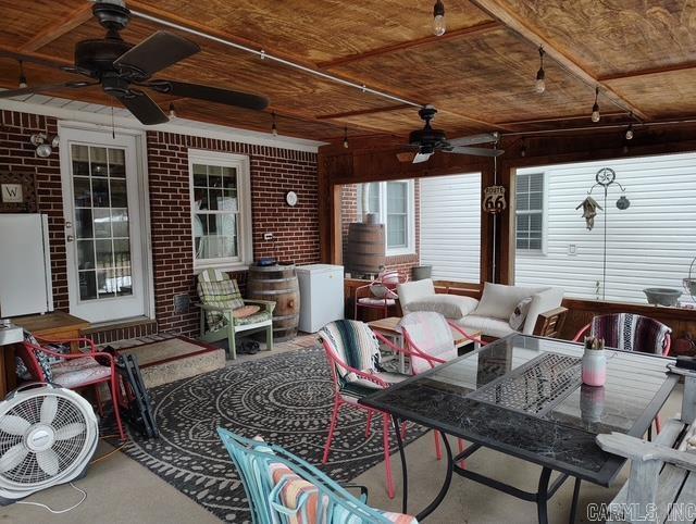 view of patio / terrace with a ceiling fan and an outdoor hangout area