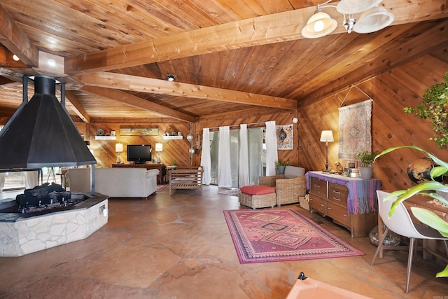 bedroom featuring wooden ceiling, wood walls, beam ceiling, and a wood stove