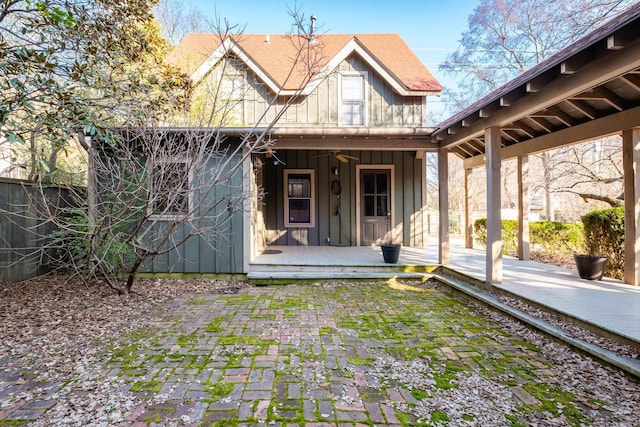 exterior space with covered porch and board and batten siding