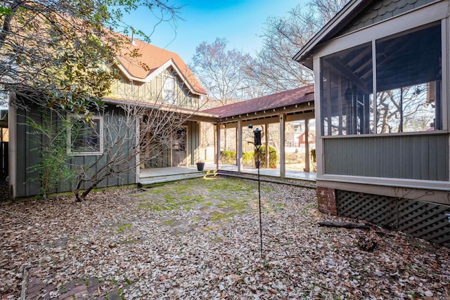 exterior space with a sunroom