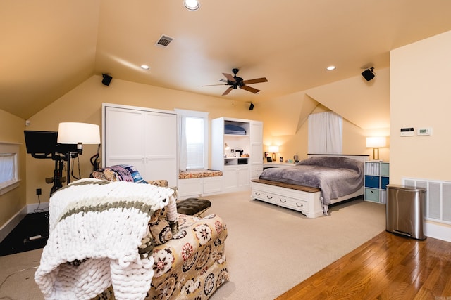 bedroom featuring lofted ceiling, a ceiling fan, visible vents, and recessed lighting