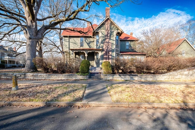 victorian home with a chimney