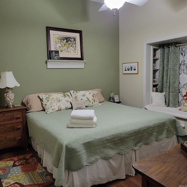 bedroom featuring ceiling fan and wood finished floors